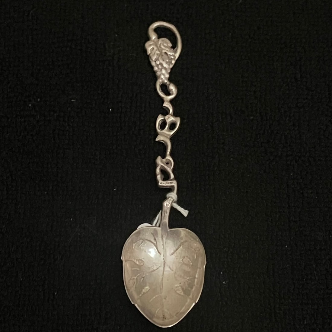 800 Silver Fruit Pendant/Charm Spoon 17.0 g: Silver-tone hanging jewelry item with ornate hook clasp, decorative articulated links, and a fruit-form suspended pendant. The clasp appears marked in Hebrew with “800.” Lower pendant shows