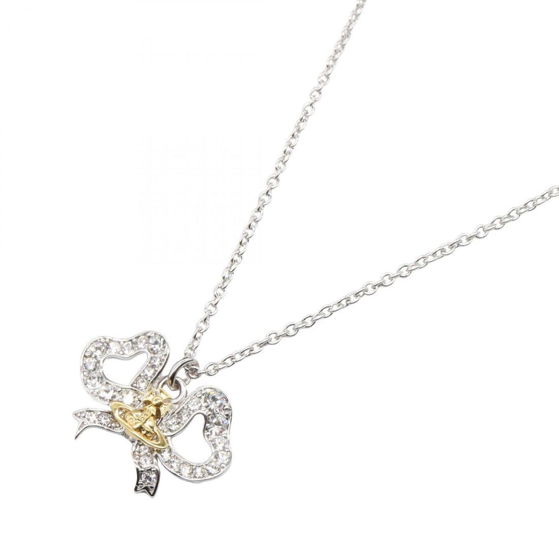 Vivienne Westwood Ribbon Orb Necklace: Silver and gold Rigoberta Ribbon Orb necklace in brass; includes storage box and storage bags; length 39-43cm.