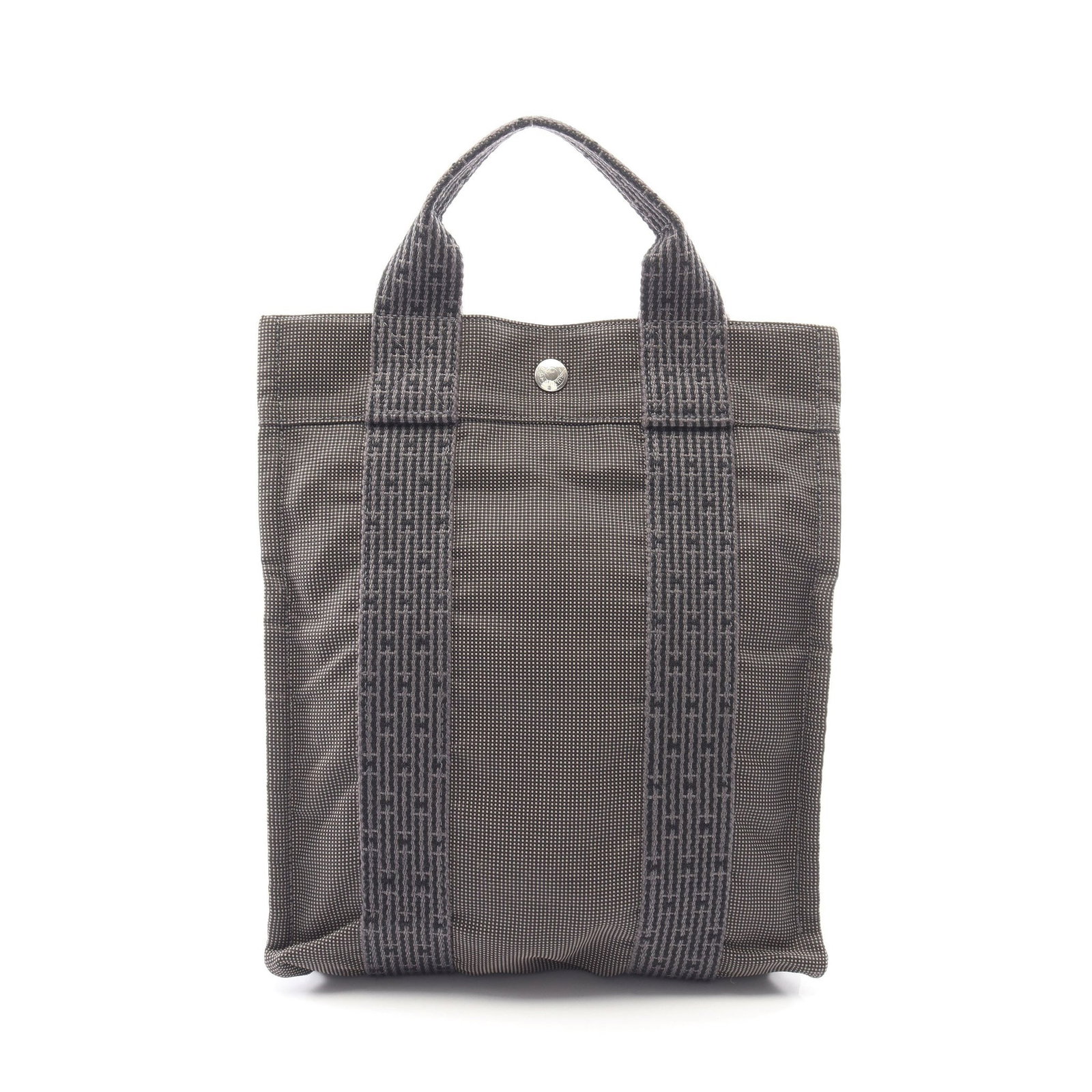 Hermes Yell Line Ad PM Backpack: Dark gray Yell Line Ad PM backpack in nylon canvas with silver hardware. Size: H30 x W26-25.5 x D6 cm; handle 25 cm; strap 42-75 cm.