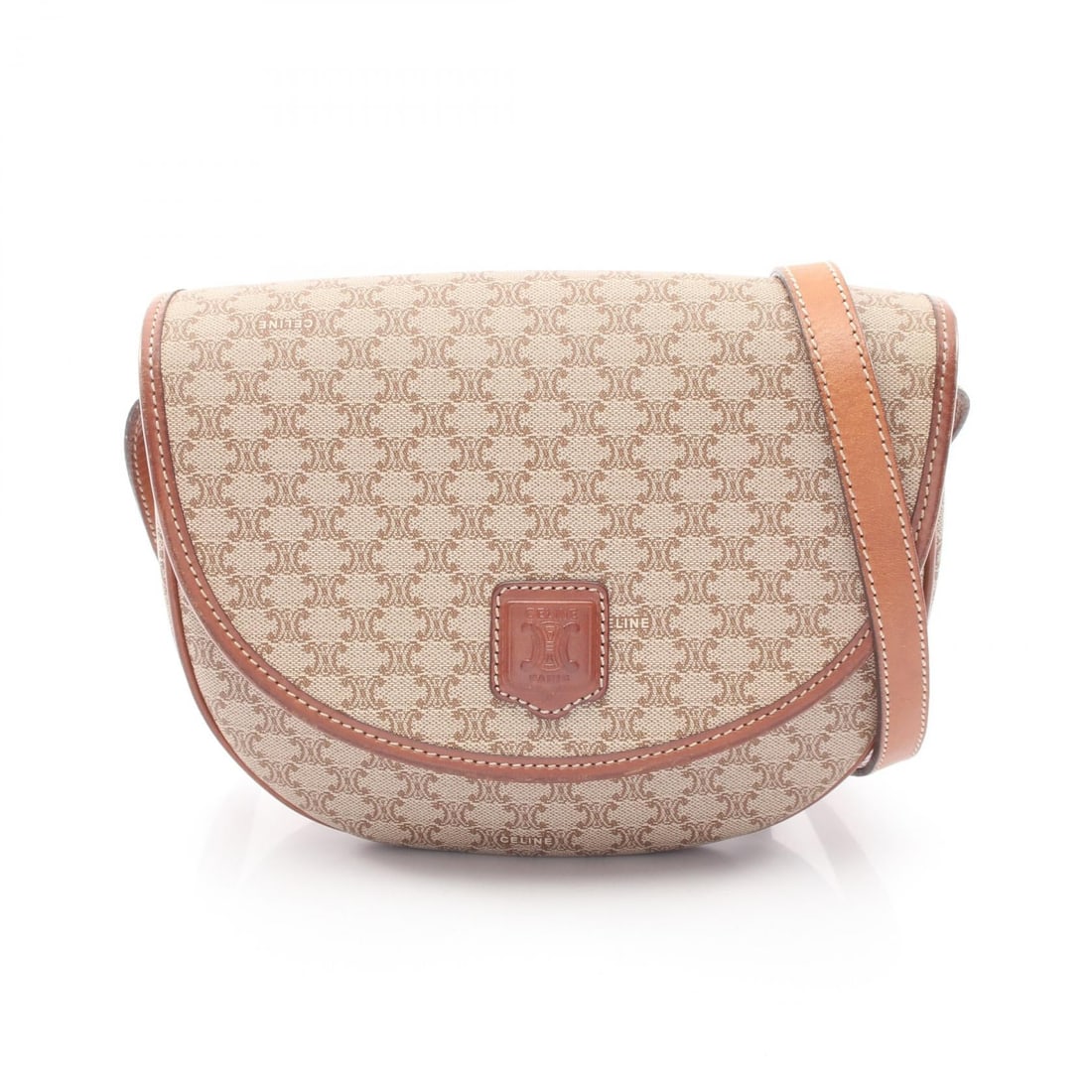 Celine Triomphe Shoulder Beige Brown: Beige brown Triomphe shoulder bag in PVC and leather. Size: H16.5 x W21 x D4 cm; strap 117-131 cm.