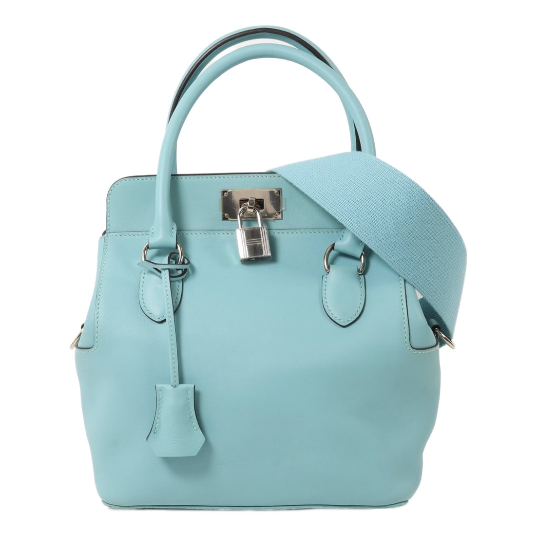 Hermes Toolbox 20 Swift Bleu Atoll 2Way: PHW. Bleu Atoll Tool Box 20 2-way shoulder bag in Veau Swift calfskin. Accessories: storage bags, shoulder strap, clochette, key, cadena, rain cover. Product no.: THA005HNT (2015 year). Size: W20 x H2
