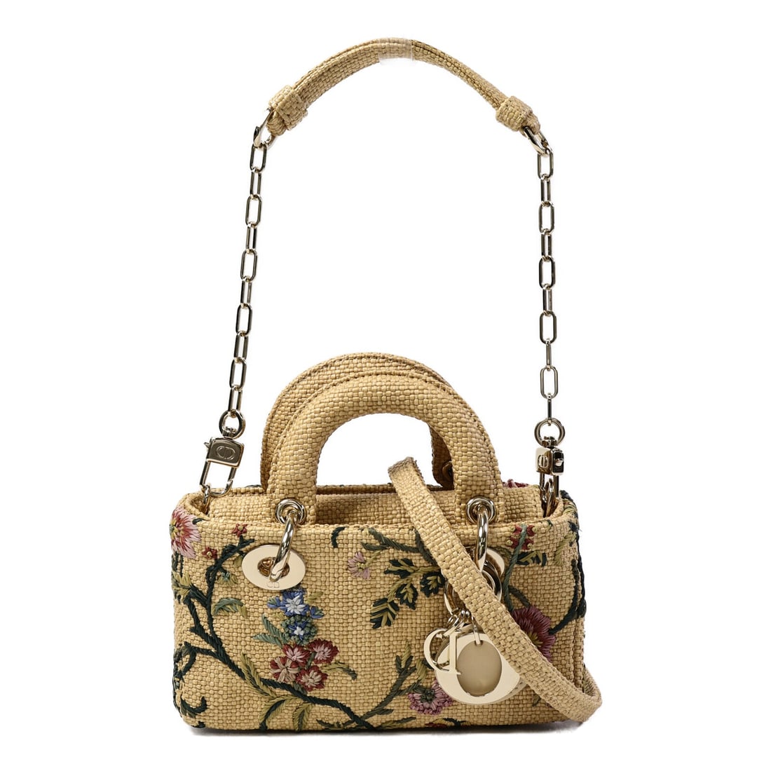 Dior Lady D-Joy Micro Raffia Beige: Beige Lady D-Joy Micro 2-way shoulder bag in raffia. Accessories: storage bags, shoulder strap. Product no.: 04-MA-0233. Size: W17 x H10 x D4.5 cm; handle 18 cm; shoulder 87-102 cm.