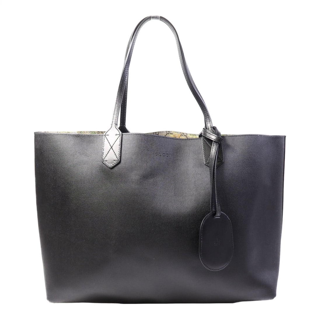 Gucci GG Reversible Tote Black: Black GG Reversible Tote Bag in PVC coated canvas, model 368568. Product no.: 213817. Size: W33.5 x H29 x D11.5 cm; handle 48 cm.