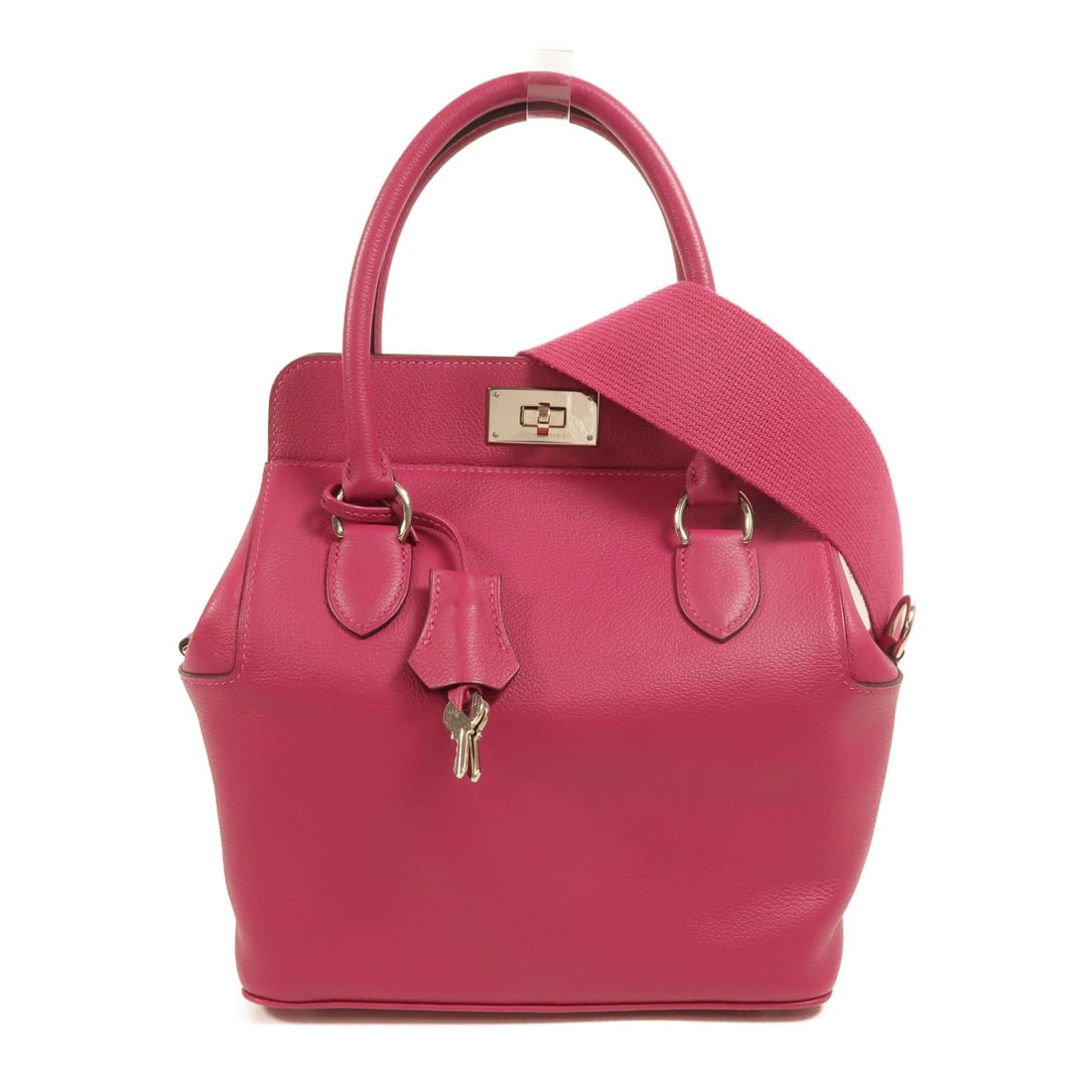 Hermes Toolbox 20 Rose Pourpre: PHW. Rose Pourpre Toolbox 20 2 Way shoulder handbag in Evercolor calfskin. Accessories: shoulder strap, clochette, key. Product no.: BY 009 HK. Size: W20 x H24 x D15 cm; handle 24 cm; shoulder max 79 