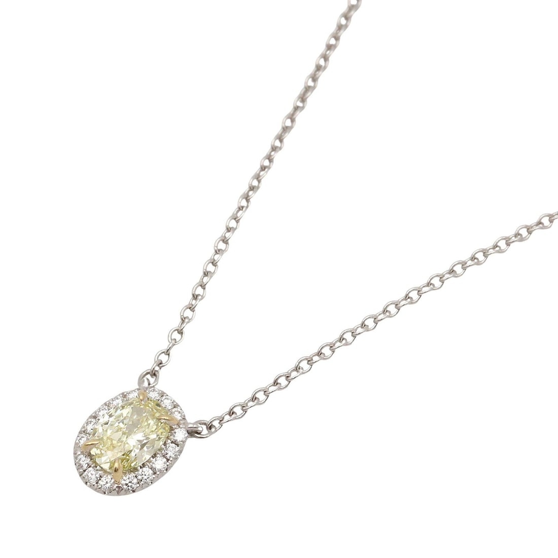 Tiffany Soleste Diamond Gold Necklace: White gold, yellow gold, yellow, and clear Soleste diamond necklace in K18WG and K18YG; length 40cm; charm 7.5 x 6cm.