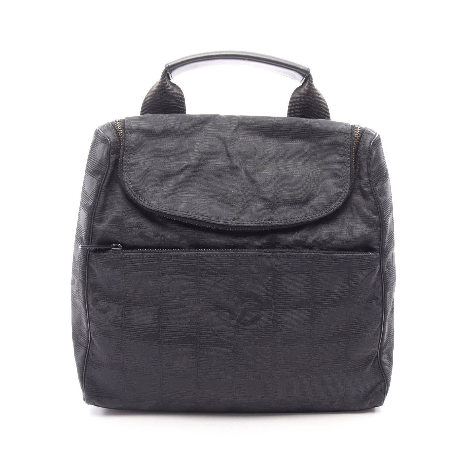 Chanel New Travel Line Backpack: Black nylon canvas and leather backpack with guarantee card and serial seal.