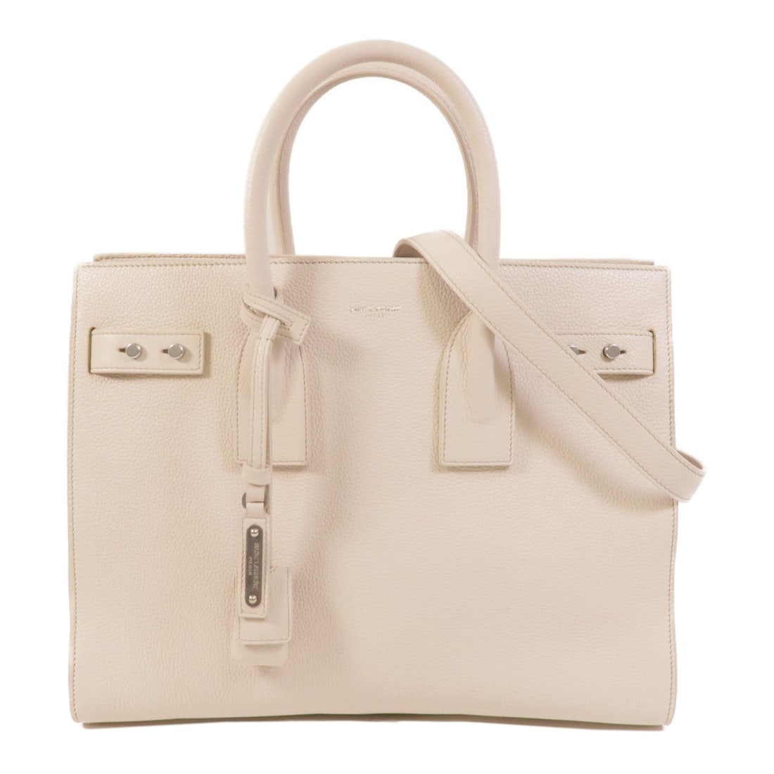 Saint Laurent Sac de Jour White: White calfskin 2-way shoulder bag with strap, clochette, key, and padlock.