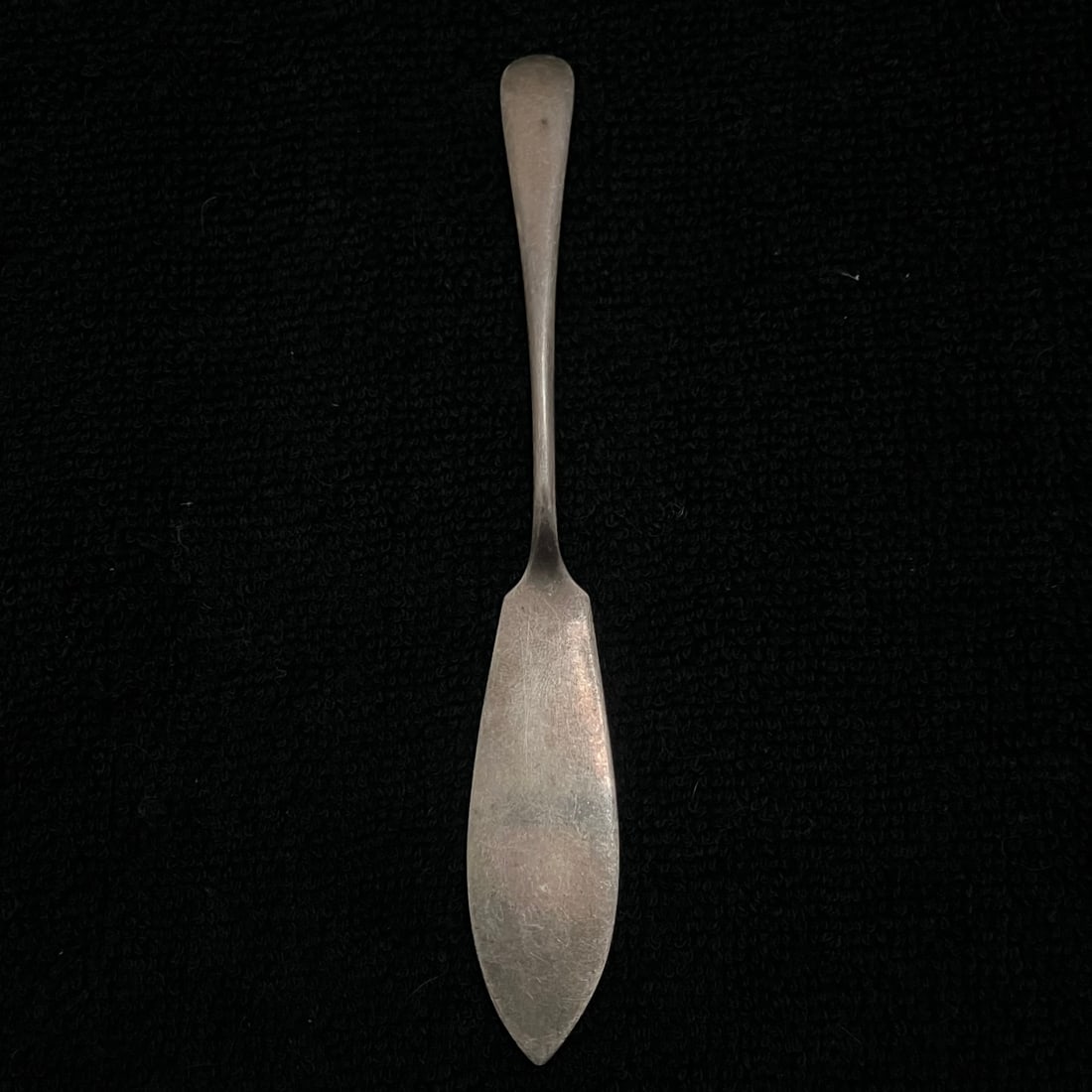 Hallmarked Sterling Silver Small Spreader Spatula 15.9 g: Small hallmarked silver flatware utensil with a narrow handle and broad pointed spreading end. Punched marks include an apparent A&D maker or sponsor mark and additional British-style assay marks. App