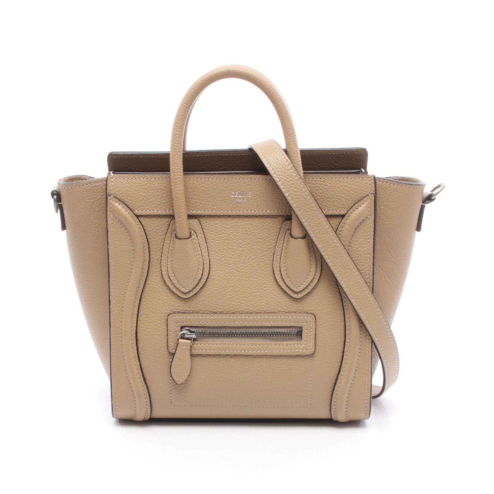 Celine Luggage Nano Shopper Beige: Leather 2 way handbag in beige. Includes shoulder strap. H 20 cm; W upper 28 cm, bottom 20 cm; D 9 cm; strap 121 cm; handle 29 cm.