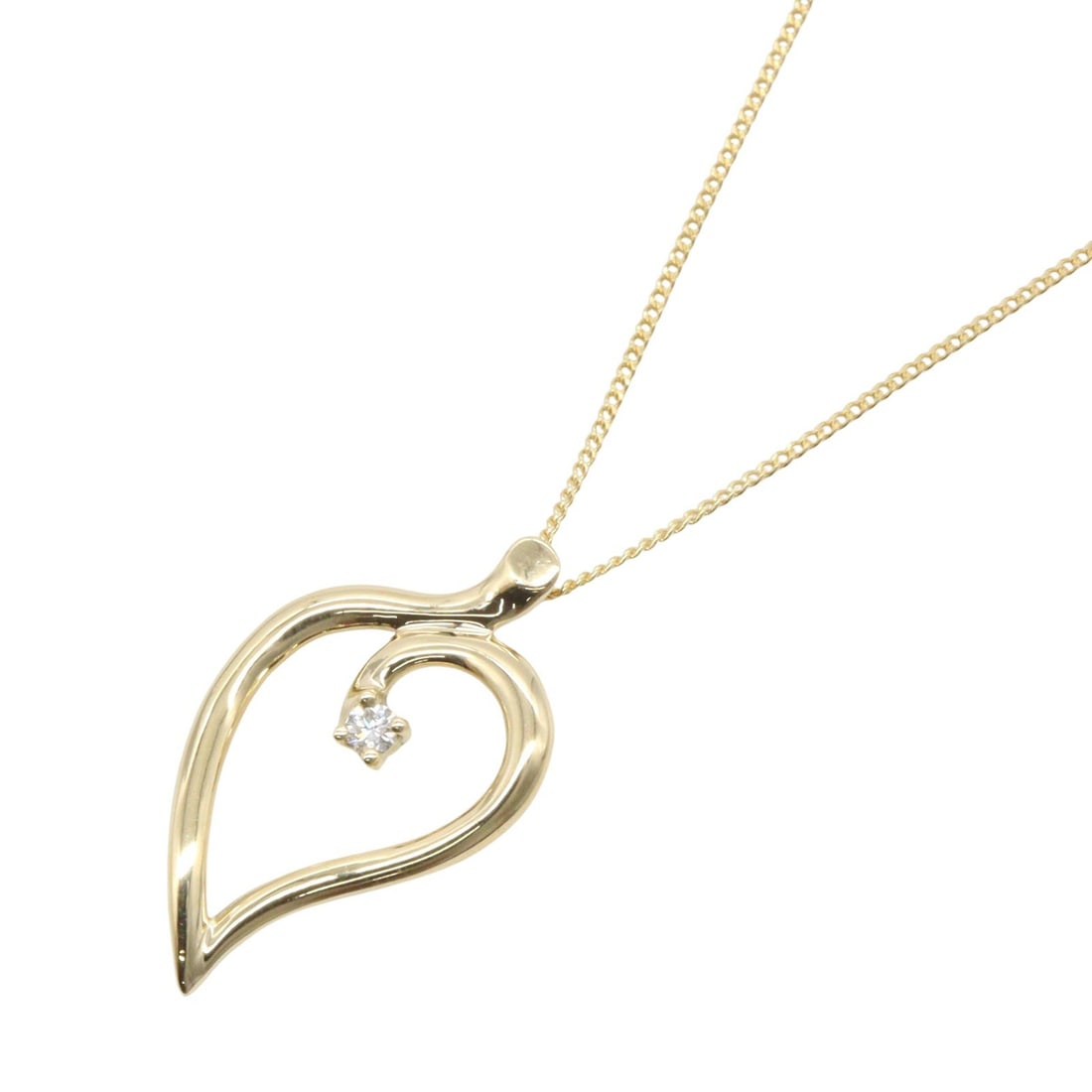 Tiffany Leaf Diamond Necklace 18K Yellow Gold: Leaf necklace with clear diamond in 18K yellow gold. 47cm chain with 2.5 x 1.5cm charm. No accessories included.