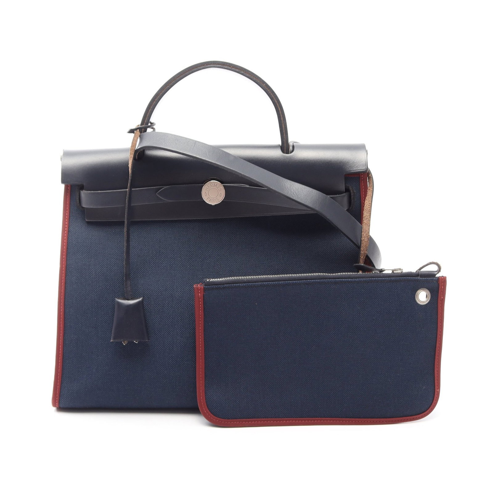 Hermes HerBag Zip PM Blue Marine: Navy and bordeaux Toile Military Vache Hunter HerBag Zip PM 2WAY handbag with silver hardware. T stamp, manufactured around 2015. Includes shoulder strap, padlock, 2 keys, crochet, pouch and stopper.