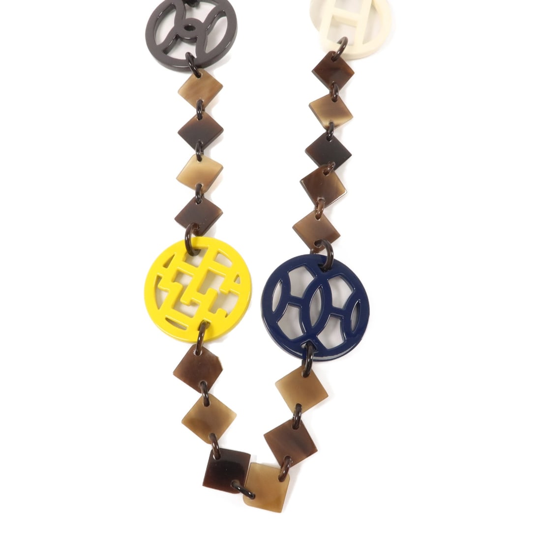 Hermes Lena Buffalo Horn Necklace: Lena collar necklace in buffalo horn and lacquered wood. Color combination: Brown / Blue / Yellow / White / Blue / Bl. 106cm length. No accessories included.