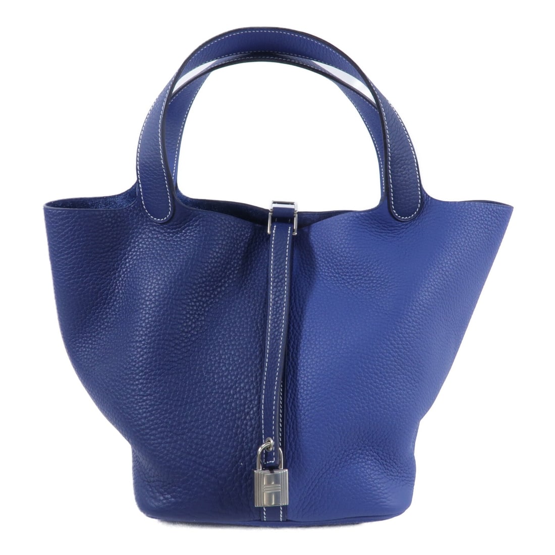 Hermes Picotin Lock MM Bleu Nuit: Taurillon Clemence calfskin tote in Bleu Nuit and Bleu France. Includes key and padlock. Size 18 x 22 x 22 cm; handle 36 cm.