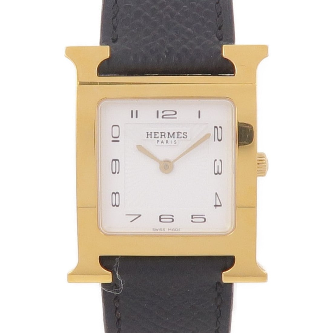 Hermes H Watch Quartz Gold Plated White: Quartz watch in gold plated metal, black / white color. Accessories: storage box, guarantee. Case length 35mm; case side 26mm; max arm circumference 18cm; band width 18-20mm.