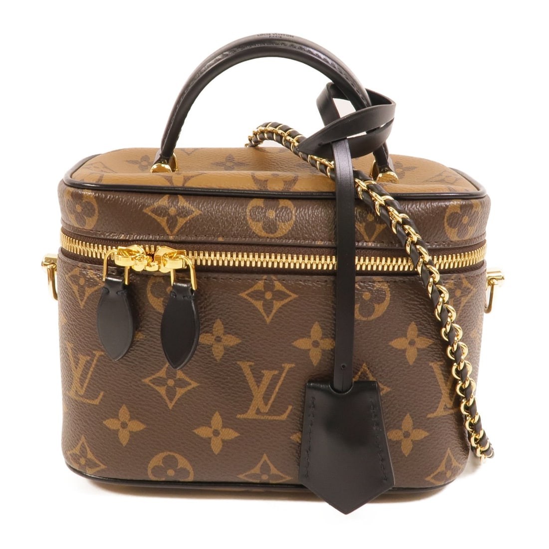 Louis Vuitton Vanity PM Reverse Monogram: Monogram Reverse PVC coated canvas 2 way shoulder bag in brown with GHW. Includes storage box, storage bags, shoulder strap, clochette, key, and padlock. Size 18 x 13 x 10.5 cm; handle 18 cm;