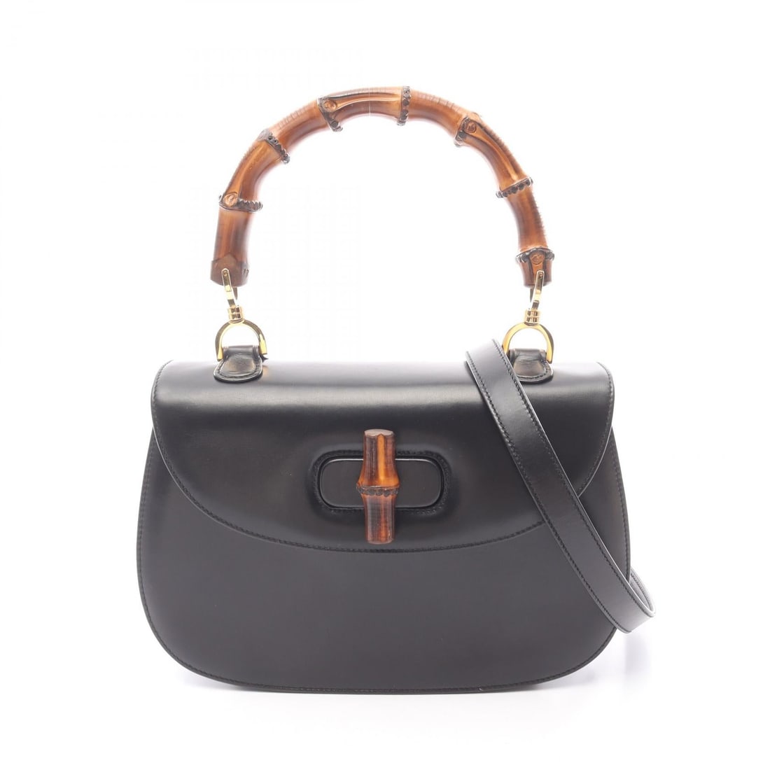 Gucci Bamboo Handbag Black Leather: Black leather Bamboo handbag. Size: W25 x H17 x D6 cm. Handle 38 cm. Shoulder 108 cm. Includes shoulder strap.