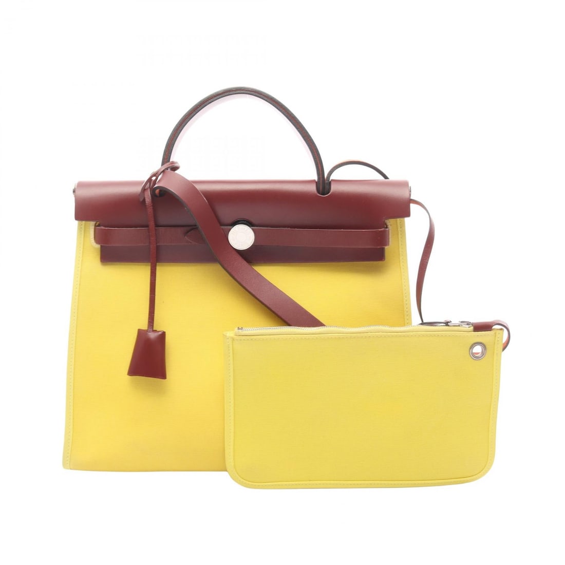 Hermes Herbag Zip PM Lime Bordeaux: Herbag Zip PM handbag in lime yellow and bordeaux Toile officier canvas with leather and Vache leather hunter trim. Size: W31 x H24 x D10 cm. Handle 23 cm. Shoulder 97 cm. Includes shoulder strap cloc