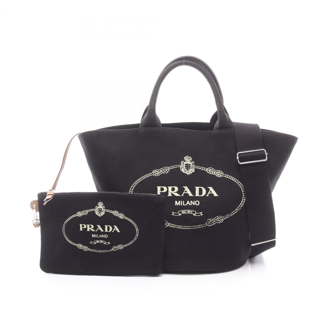 Prada Canapa 2 Way Tote Black: Canapa 2 way tote bag in black canvas. Size: W25 x H29 x D18 cm. Handle 36 cm. Shoulder 63-107 cm. Includes shoulder strap and pouch.
