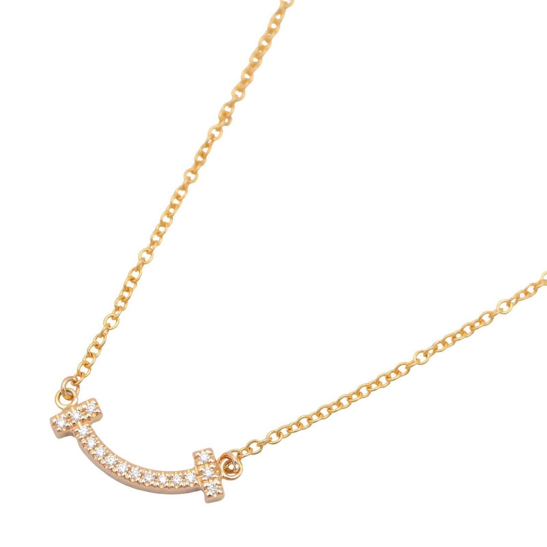 Tiffany T Smile Mini Diamond Necklace K18PG: Color: Clear / Gold; Material: K18PG (Rose Gold), diamond; Neck: 40.5/45.5cm; Motif: 13.5mm x 3.6mm; Weight: 2.3g.