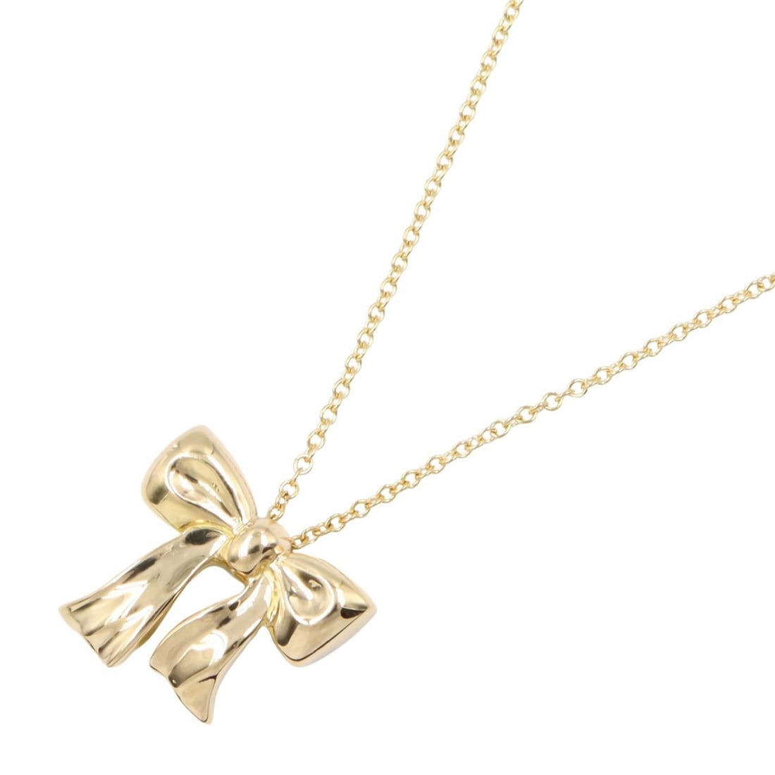 Tiffany Ribbon Necklace 18K Yellow Gold: Ribbon necklace in K18 yellow gold. Neck size 41.5cm. Motif 15mm wide x 14mm high. Weight 4.0g.