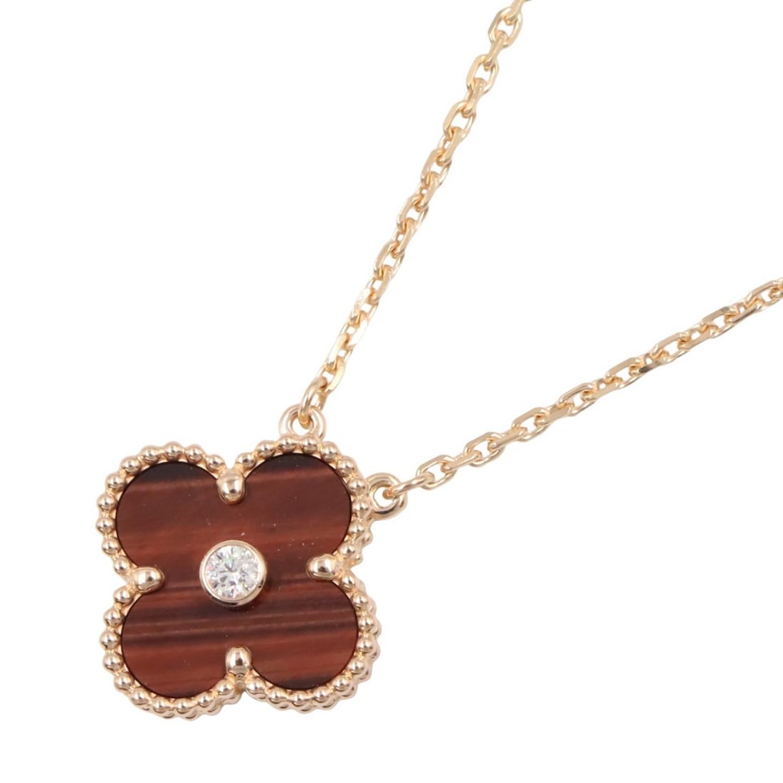 VCA Vintage Alhambra Bullseye Necklace: Vintage Alhambra 1PD necklace in K18PG rose gold with diamond and bullseye. Neck size 37-41.5cm. Motif 15mm wide x 15mm high. Weight 6.5g.