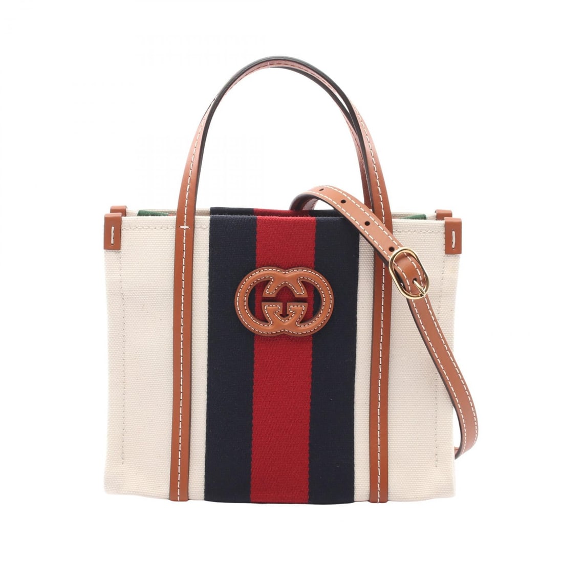 Gucci Interlocking G Mini Tote Multi: Interlocking G Mini 2 way tote bag in white, brown, and multicolor canvas with leather trim. Size: W24 x H18.5 x D11 cm. Handle 29 cm. Shoulder 118-133 cm. Includes shoulder strap.