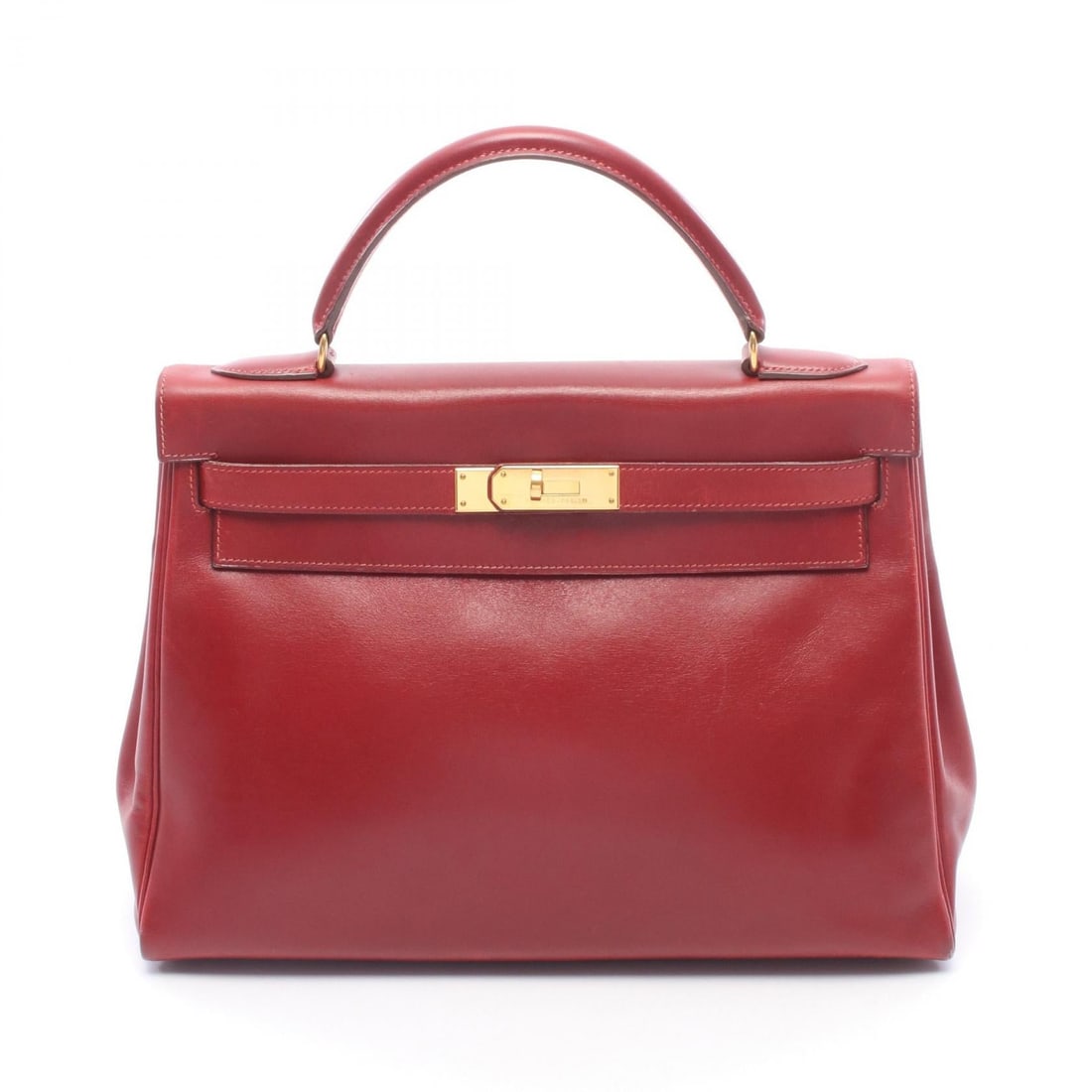 Hermes Kelly 32 Rouge Vif 2Way Bag: Rouge vif Kelly 32 2-way handbag with internal stitching in leather. Includes shoulder strap, clochette, key, and cadena. 32 x 23 x 12 cm; handle 28 cm; shoulder up to 90 cm.