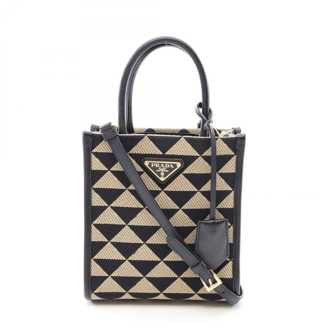 Prada Triangolo Jacquard Mini 2Way Black/Beige: Black and beige TRIANGOLO JACQUARD Symbol Embroidery Mini 2-Way bag in canvas and Saffiano leather. Includes shoulder strap. 16.5 x 18 x 6 cm; handle 25.5 cm; shoulder 112-122 cm. Model 1BA355.