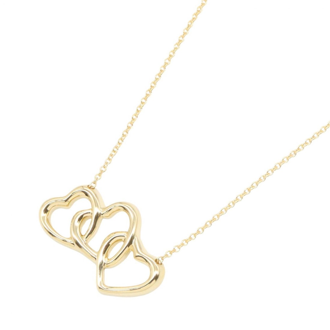 Tiffany Triple Heart Necklace 18K Gold: Triple Heart necklace in K18 yellow gold. Neck size 40cm. Motif 24mm wide x 14mm high. Weight 5.3g.