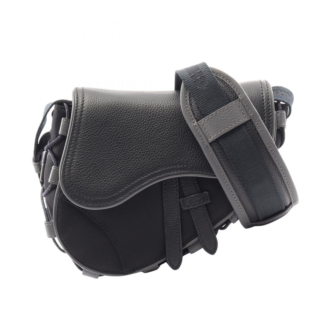 Dior x Sacai Saddle Mini Black Bag: Black Saddle Mini shoulder bag from Christian Dior x Sacai in nylon and leather. 17 x 17 x 5 cm; shoulder up to 127 cm.