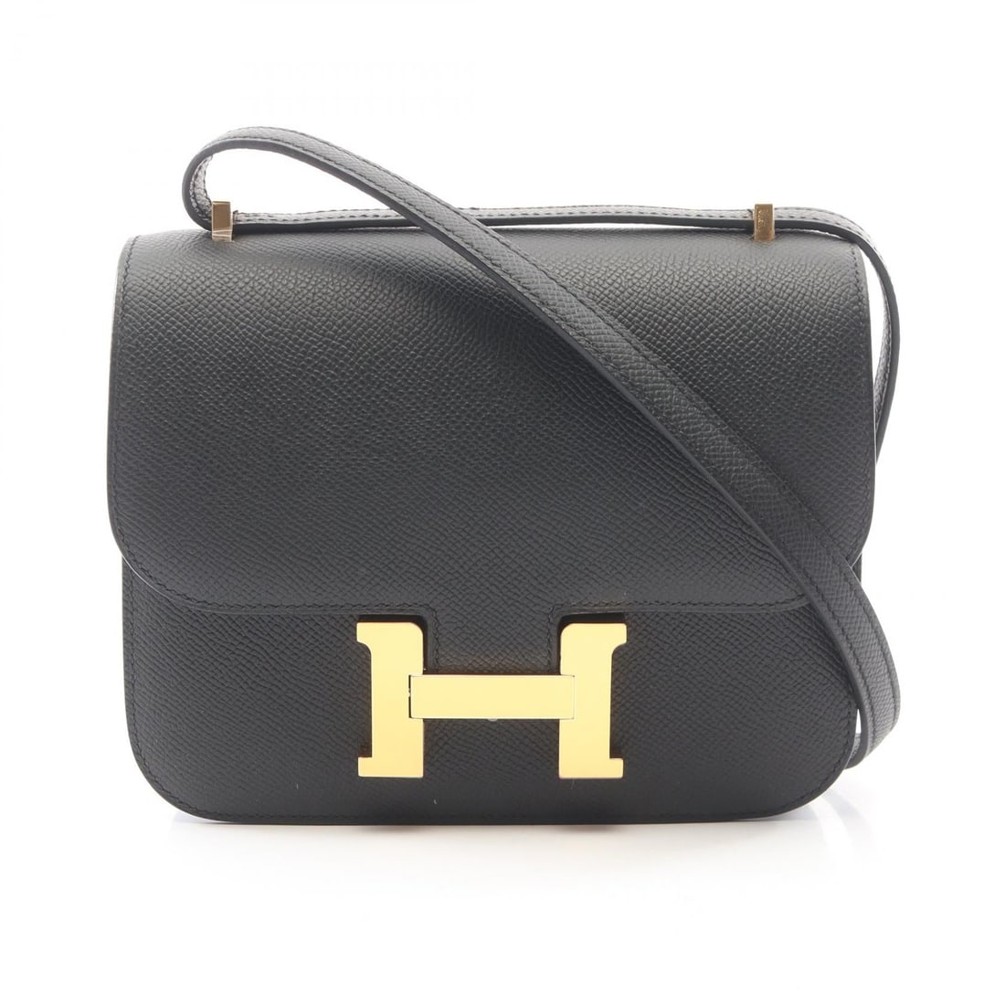 Hermes Constance 3 Mini Black Epsom: Black Constance 3 mini shoulder bag in leather, Calfskin (cowhide), and Epsom. Includes storage box and storage bags. 18 x 15 x 2/3 cm; strap drop 27 cm; shoulder up to 60 cm. Model 083905CC.