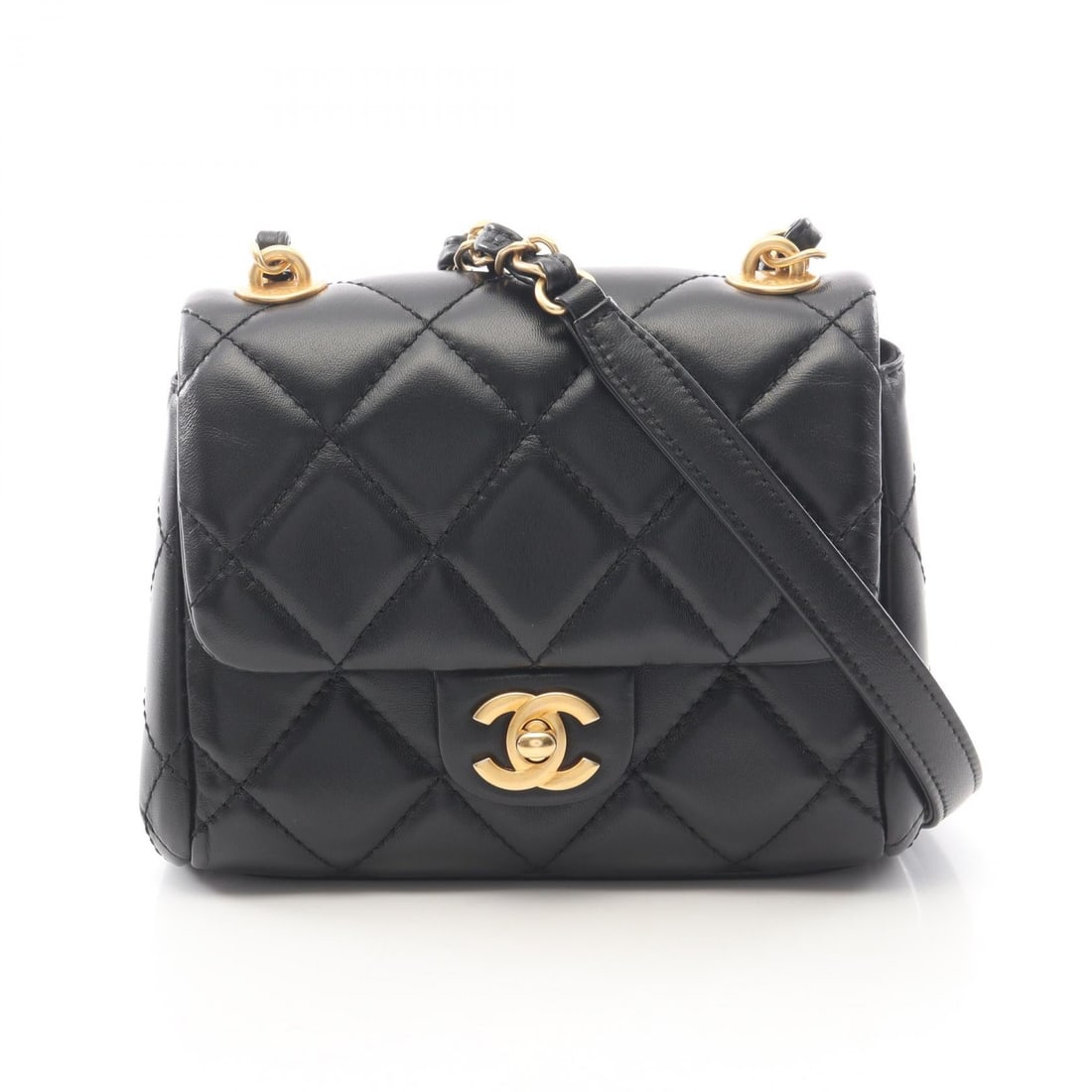Chanel Small Flap Black Lambskin: Black Matelasse small flap bag in lambskin. Size: W16 x H15 x D8 cm. Shoulder 108 cm.