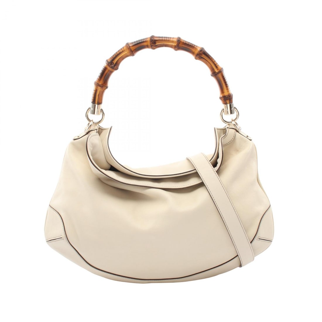 Gucci Bamboo 2 Way Handbag Beige: Beige Bamboo 2 way handbag in leather. Size: W40 x H24 x D9 cm. Handle 42 cm. Shoulder 90 cm. Includes shoulder strap.