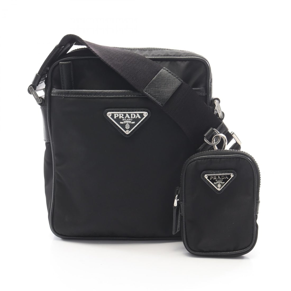 Prada Re-Nylon Shoulder Bag Black: Re-Nylon shoulder bag in black nylon with Saffiano leather trim. Size: W17.5 x H21 x D5.5 cm. Shoulder 90-135 cm. Includes pouch.