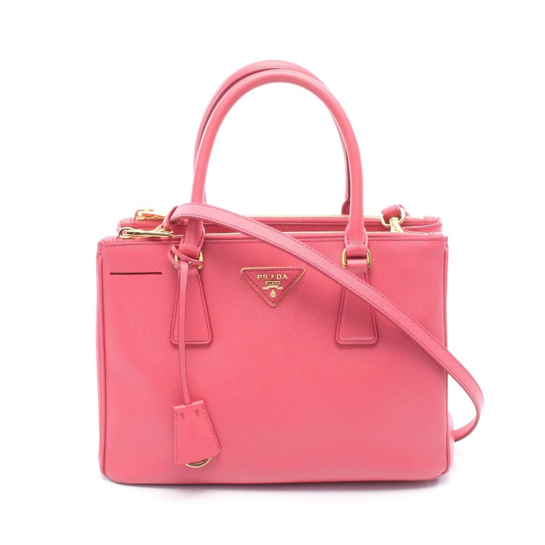 Prada Galleria Pink Saffiano: SAFFIANO LUX Galleria handbag in pink Saffiano leather. Size: W29 x H19 x D12 cm. Handle 38 cm. Shoulder 118-128 cm. Includes shoulder strap.