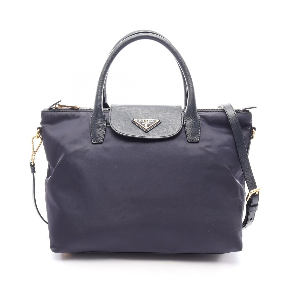 Prada Tessuto Saffi 2 Way Navy: TESSUTO + SAFFI 2 way handbag in navy nylon with Saffiano leather trim. Size: W30 x H24 x D17.5 cm. Handle 41 cm. Shoulder 118-128 cm. Includes shoulder strap.