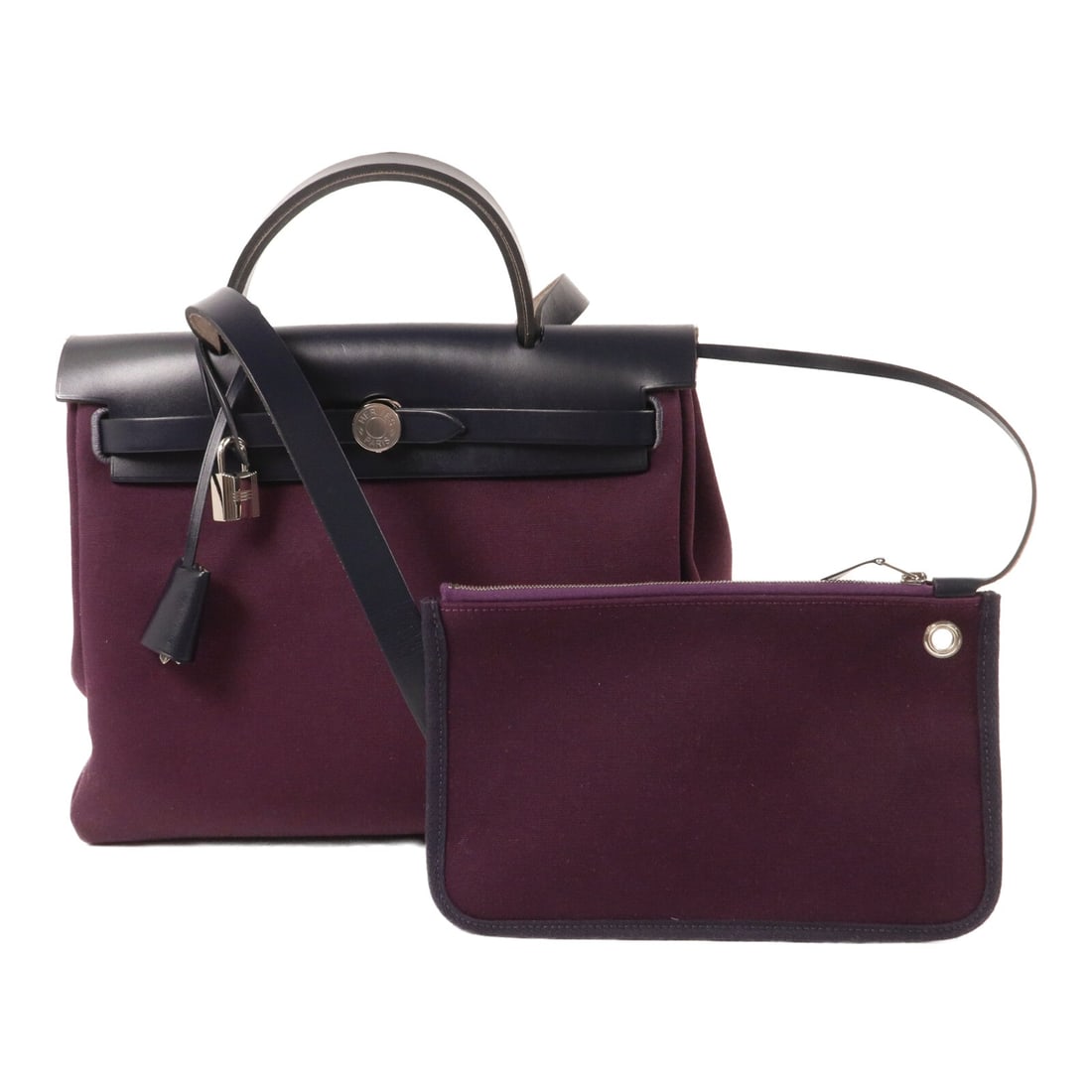 Hermes PHW Herbag PM Cassis: PHW Herbag PM 2 way shoulder bag in Cassis canvas. Size: W30 x H24 x D11 cm. Handle 23 cm. Shoulder 98 cm. Includes storage bags clochette key cadena and pouch. 2019 stamp.