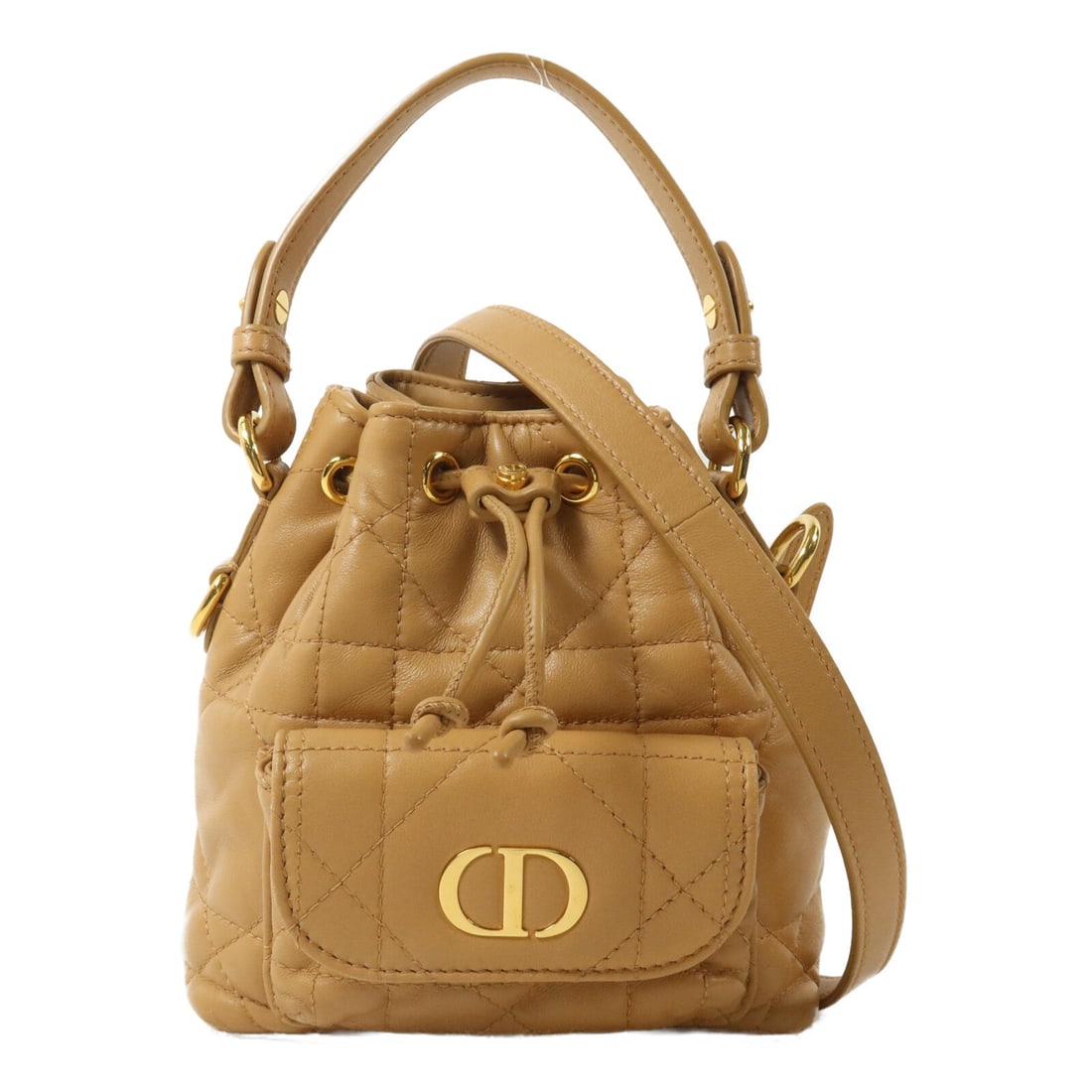 Dior Nano Caro Bucket Brown Calfskin: Brown Nano Caro Bucket bag with CD GHW in Calfskin (cowhide). Includes shoulder strap. 14 x 14 x 6 cm; handle 22 cm; shoulder 109-124 cm.