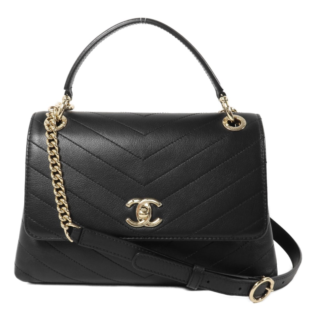 Chanel Top Handle Flap GHW Black 2Way: Black Top Handler Flap 2-way chain shoulder bag with CC GHW in Calfskin (cowhide). Includes storage bags, hologram sticker, and guarantee. 25 x 17 x 10 cm; handle 15 cm; shoulder 94-103 cm. Model A571