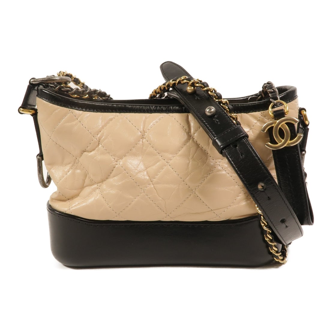 Chanel CC GHW Gabrielle Small Beige: CC GHW Gabrielle Small chain shoulder bag in beige and black calfskin. Size: W20-21 x H15 x D8 cm. Shoulder 91-150 cm. Includes hologram sticker.