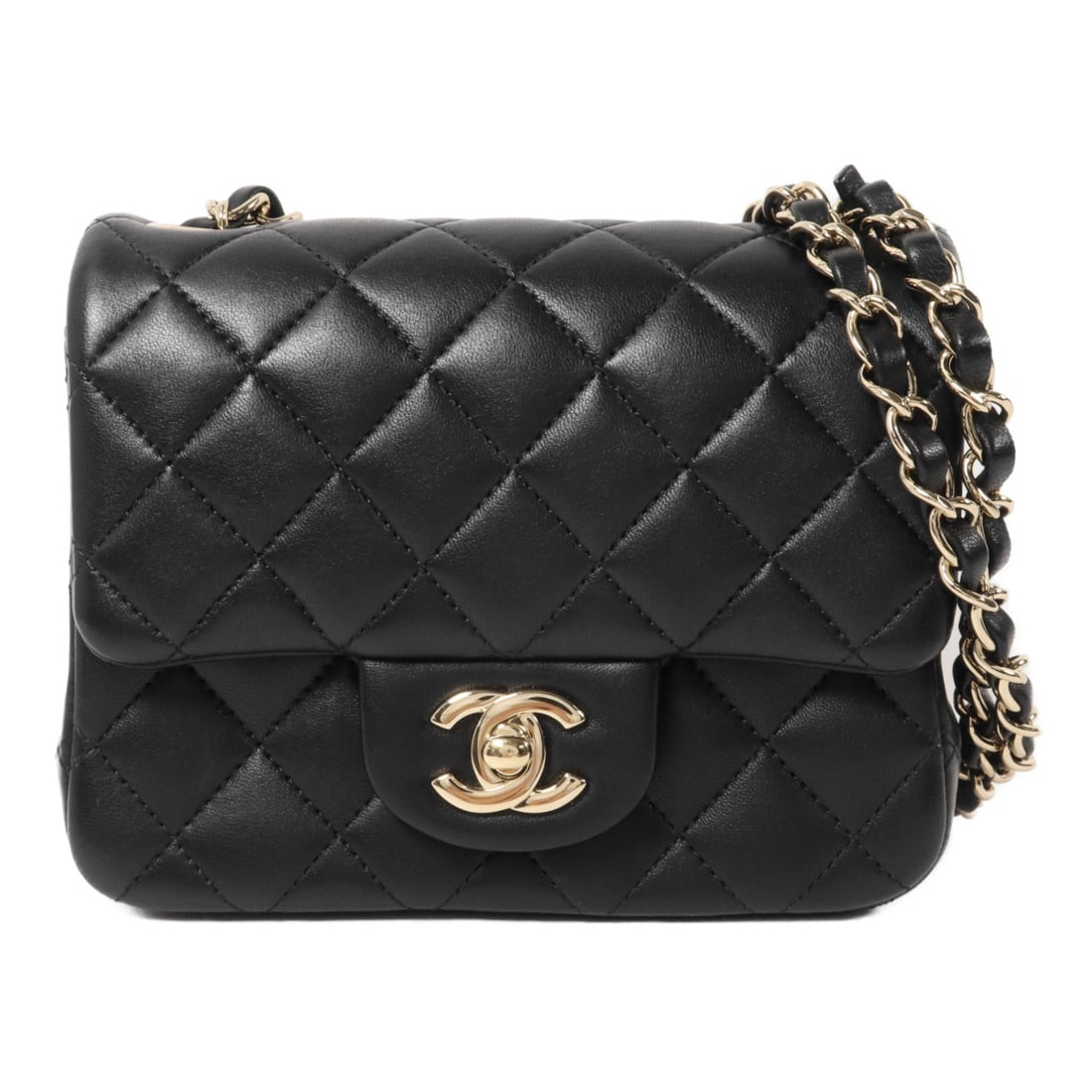 Chanel Mini Classic 17 GHW Black Bag: Black Mini Classic 17 chain shoulder bag with CC GHW in Lambskin (sheep leather). Includes hologram sticker and guarantee. 17 x 13.5 x 8 cm; shoulder up to 107 cm. Model A35200.