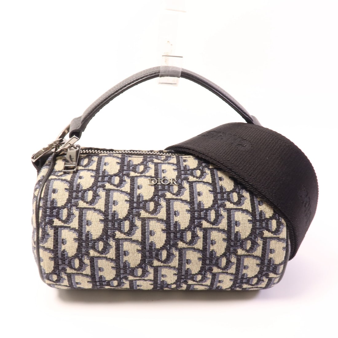 Dior CD SHW Mini Roller Blue: CD SHW Mini Roller 2 way shoulder bag in blue canvas. Size: W18 x H11 x D12 cm. Handle 23.5 cm. Shoulder 98-148 cm. Includes shoulder strap.