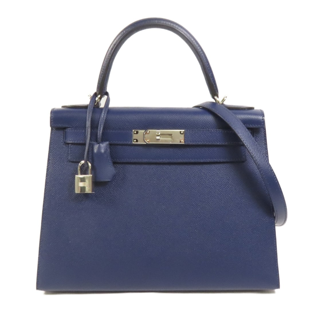 Hermes PHW Kelly 28 Bleu Saphir: PHW Kelly 28 2 way shoulder bag in Bleu Saphir Epsom calfskin. Size: W28 x H20 x D11 cm. Handle 25 cm. Shoulder 87 cm. Includes storage box, storage bags, shoulder strap, clochette, key, and cadena.
