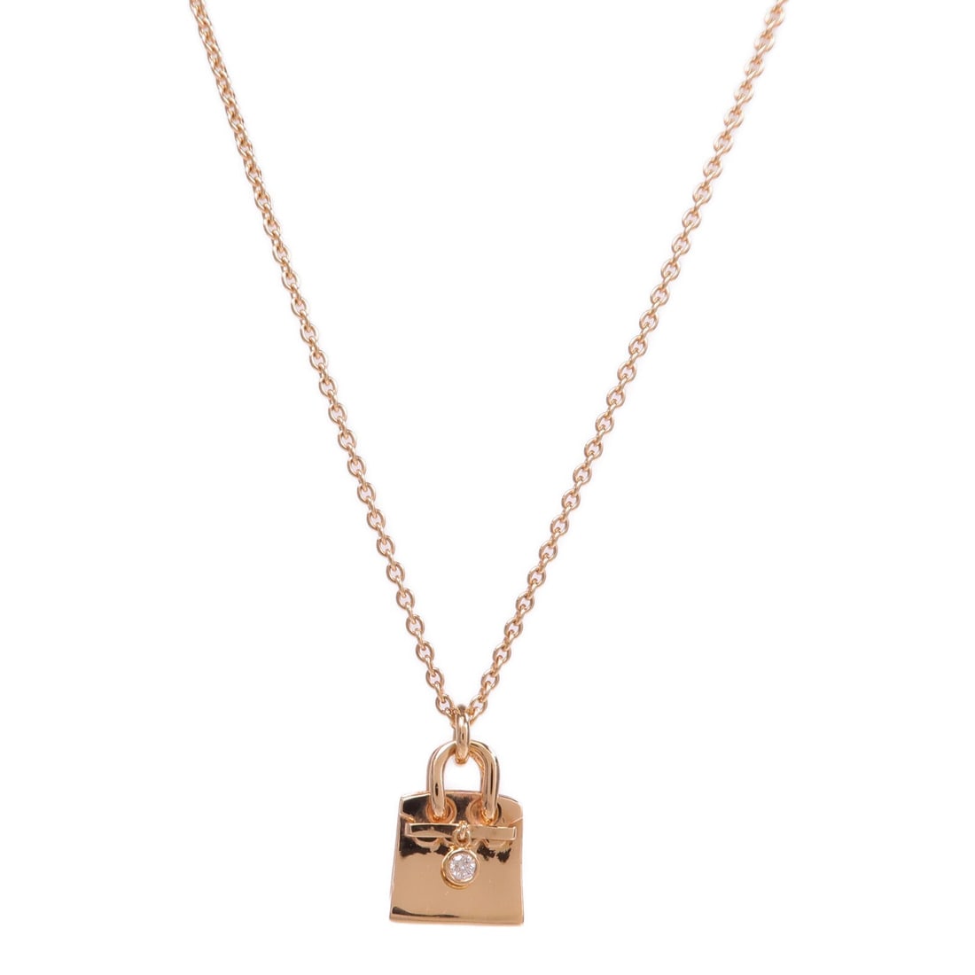 Hermes Birkin Diamond Rose Gold Necklace: Amulettes Birkin Diamond Pendant necklace in K18PG rose gold with diamond. Includes storage box. Neck size 38-40cm. Motif 10mm wide x 12mm high.
