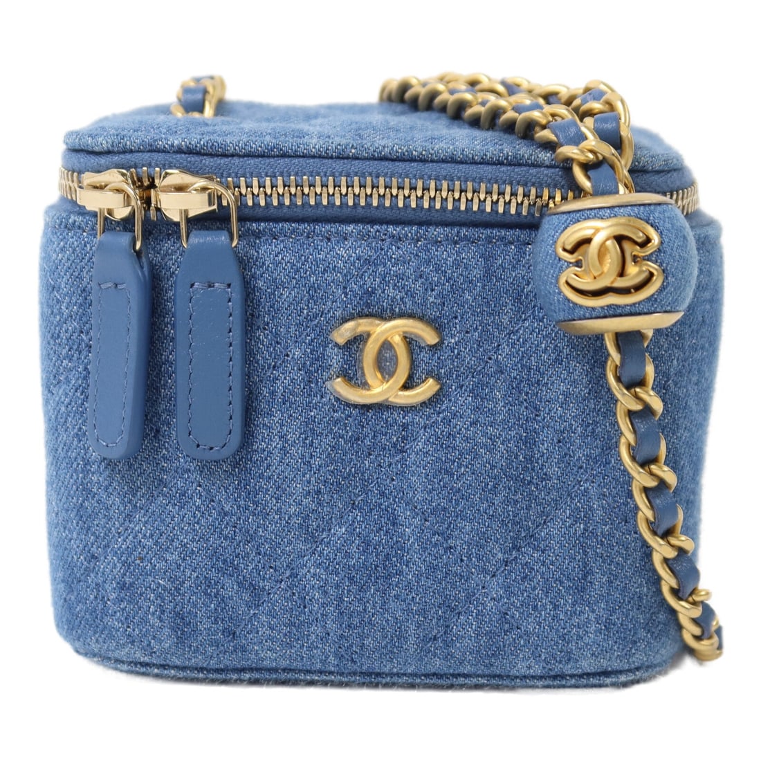 Chanel CC GHW Mini Vanity Denim Blue: CC GHW Mini Vanity Case chain shoulder back bag in blue denim. Size: W10 x H9 x D7 cm. Shoulder 114 cm. Includes storage bags hologram sticker and guarantee.