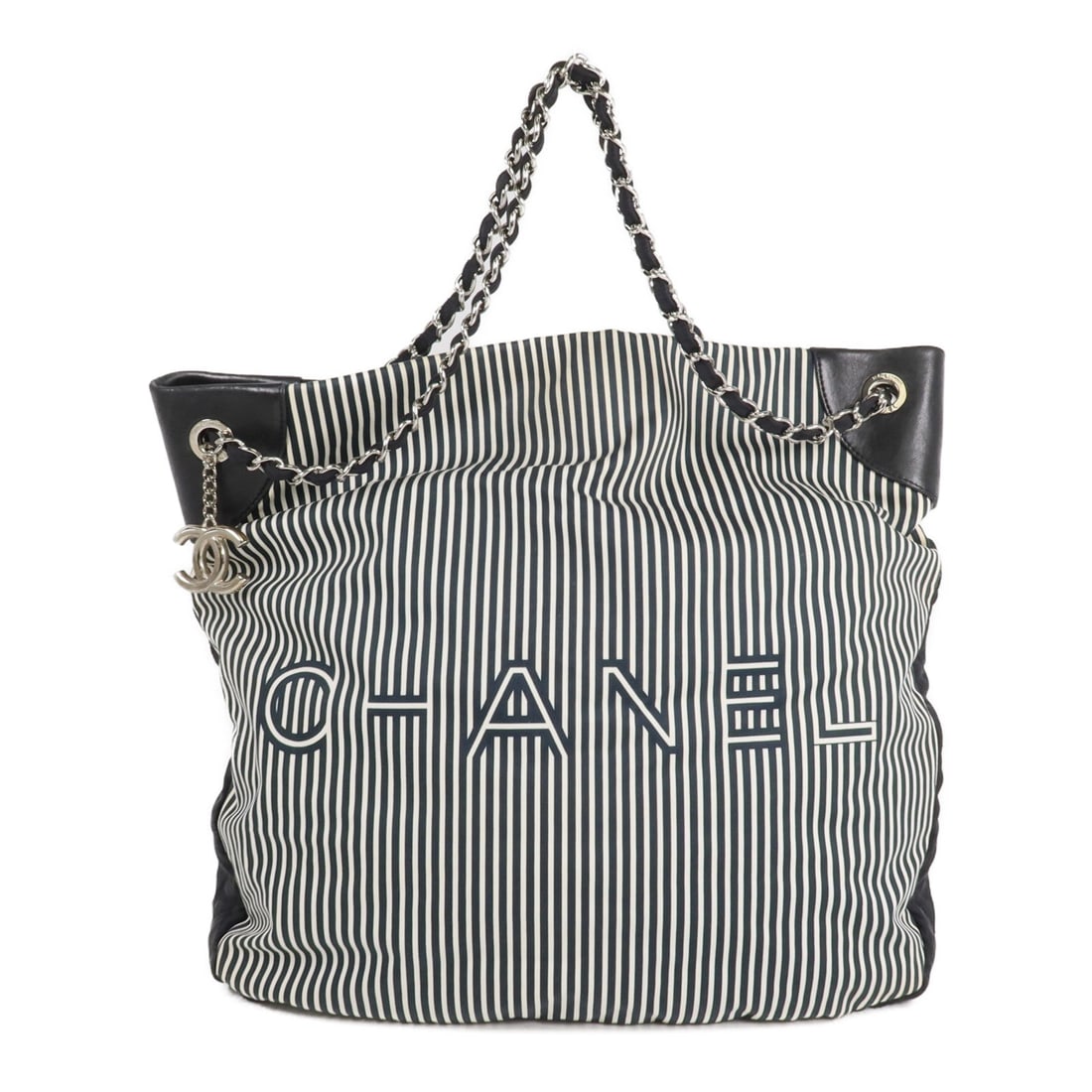 Chanel CC SHW Tote Black White: CC SHW 2 way shoulder tote bag in black and white canvas. Size: W44 x H39 x D7 cm. Handle 40 cm. Shoulder 62 cm. Includes hologram sticker.