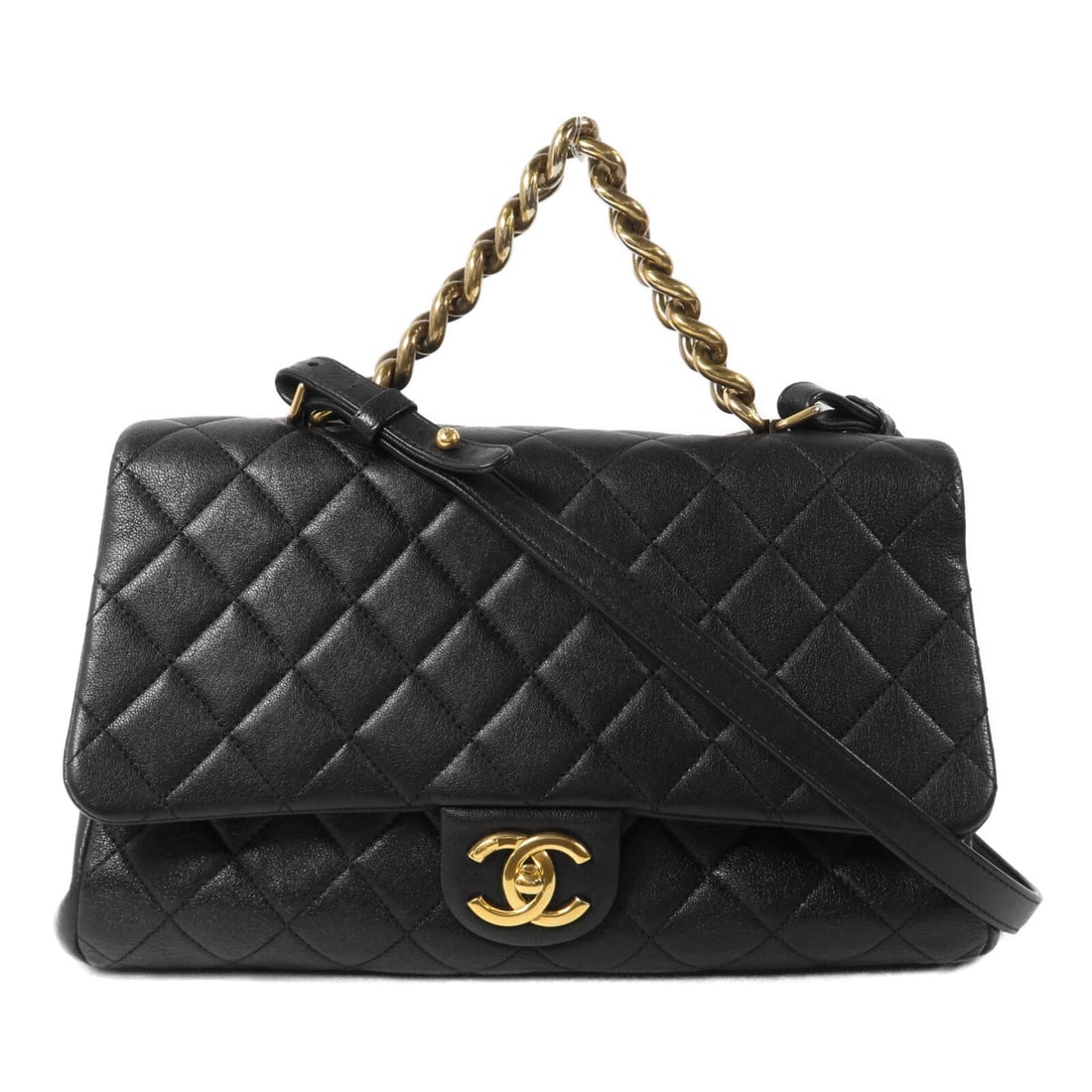 Chanel CC GHW Trapezio Flap Black: CC GHW Trapezio Flap Bag 2 way shoulder bag in black calfskin. Size: W33 x H19 x D14 cm. Handle 23 cm. Shoulder 108-114 cm. Includes storage bags and hologram sticker.