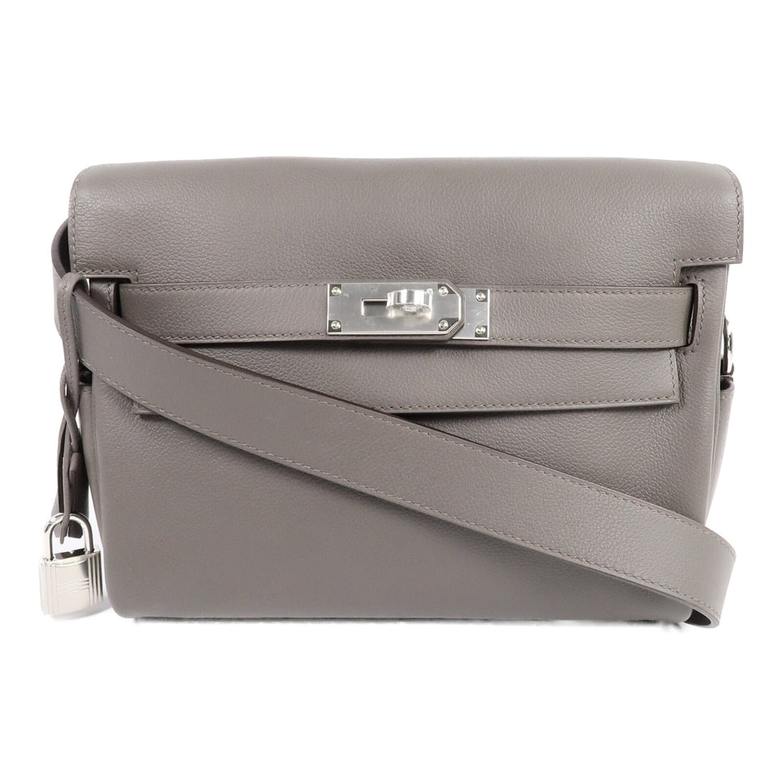 Hermes Kelly Messenger PM Etain PHW: Etain Kelly Messenger PM shoulder bag with PHW in Calfskin (cowhide). Includes storage box, storage bags, shoulder strap, clochette, and cadena. 23.5 x 18 x 10.5 cm; shoulder 96-126 cm. Model