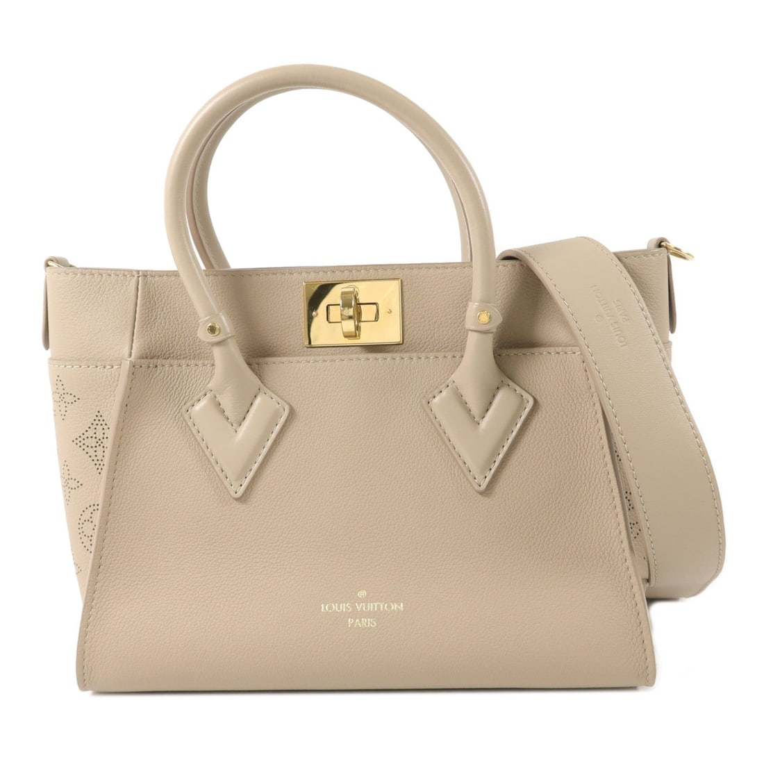 Louis Vuitton LV GHW On My Side PM: LV GHW On My Side PM 2 way shoulder bag in beige Monogram Mahina calfskin. Size: W25 x H19 x D12 cm. Handle 26 cm. Shoulder 100 cm. Includes storage bags and shoulder strap.