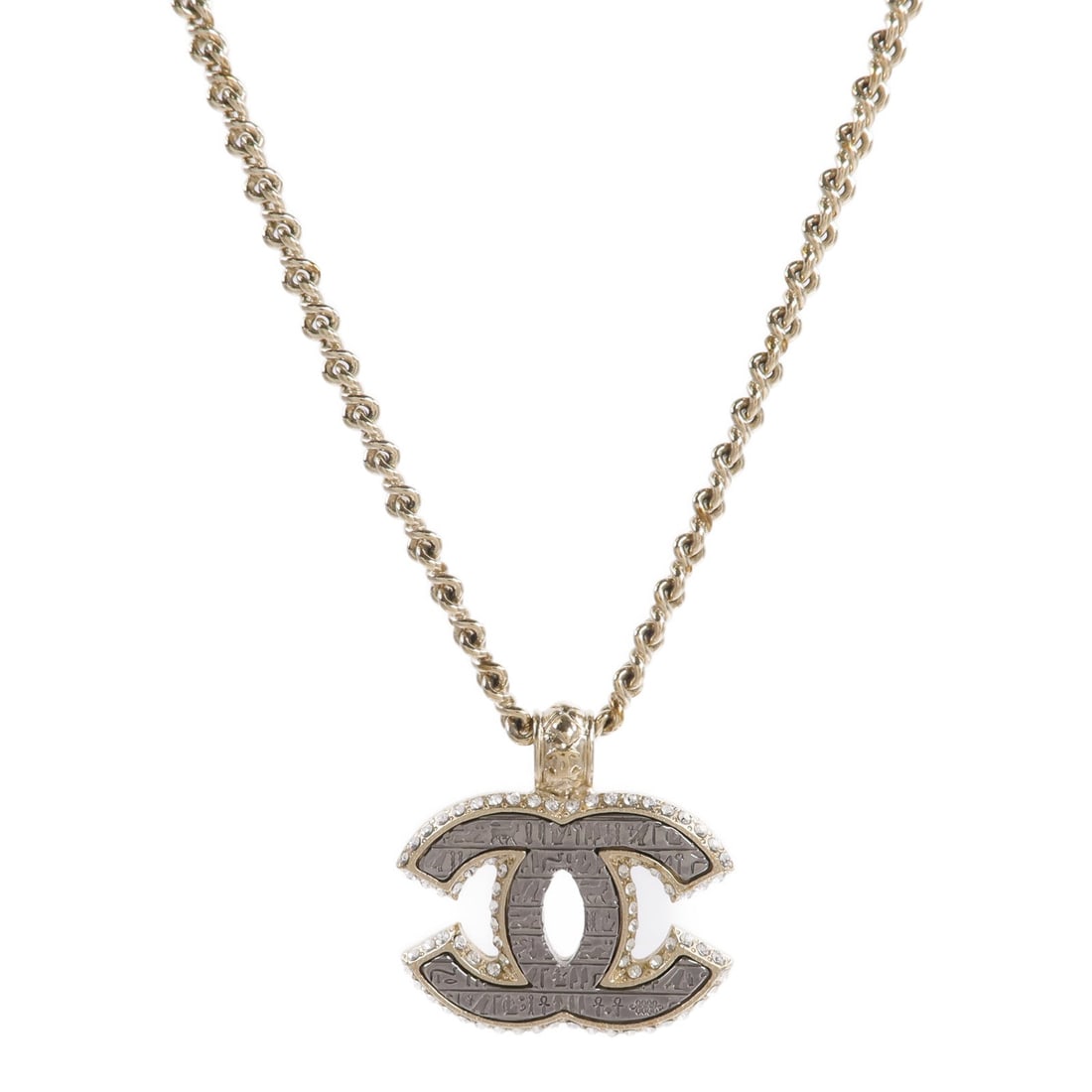 Chanel CC Gold Metal Necklace: Gold-tone CC necklace in metal. Includes storage box. Neck size 42-60cm. Motif 3.3mm wide x 3.3mm high.